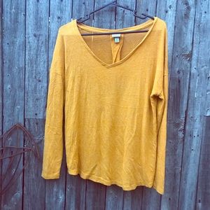 mustard yellow shirt